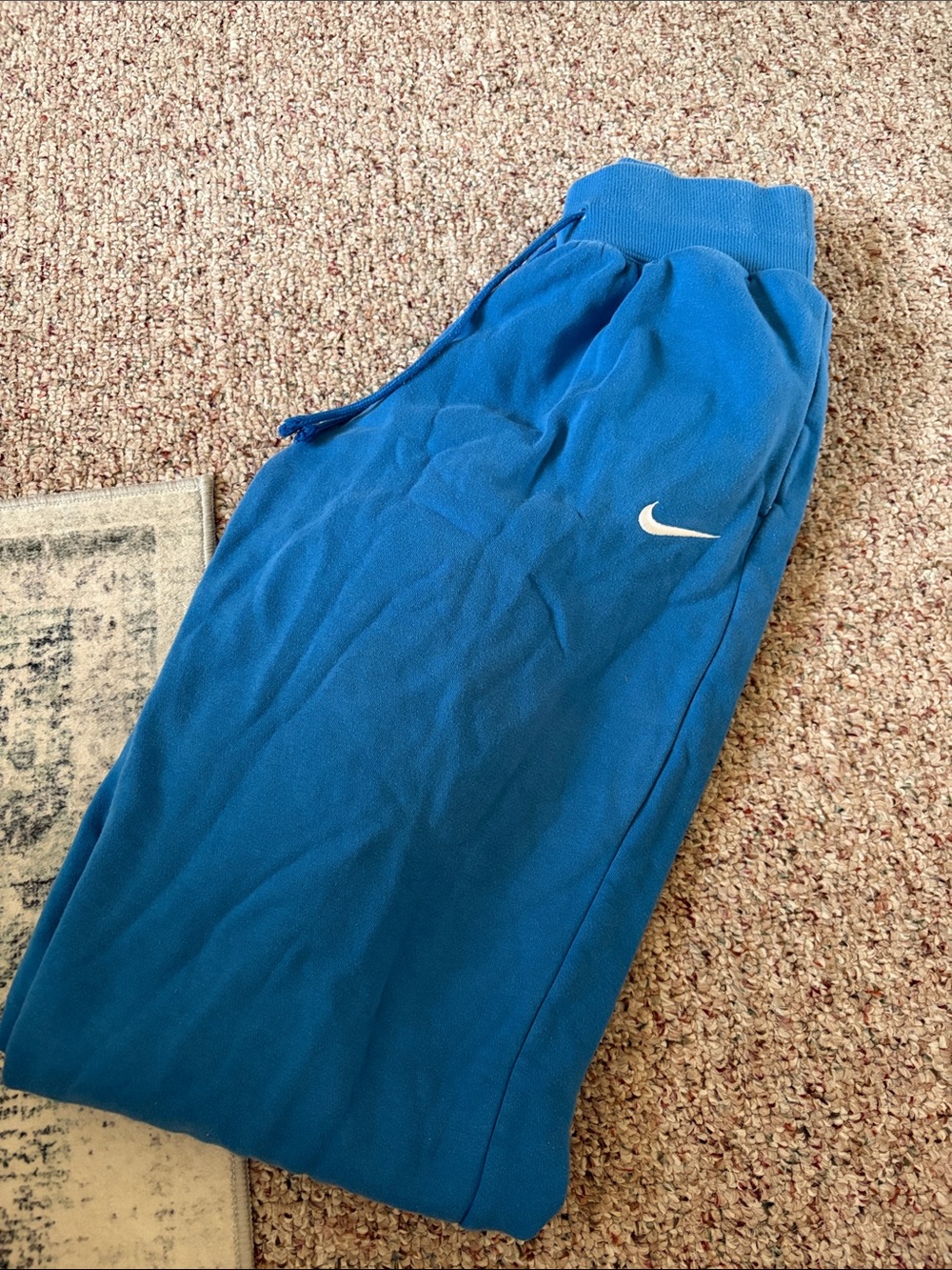 Nike Blue Track Pants with White Swoosh
